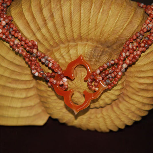 Multi Strand Twisted Sesame Jasper Necklace with Floral Cutout Orange Agate Focal Pendant