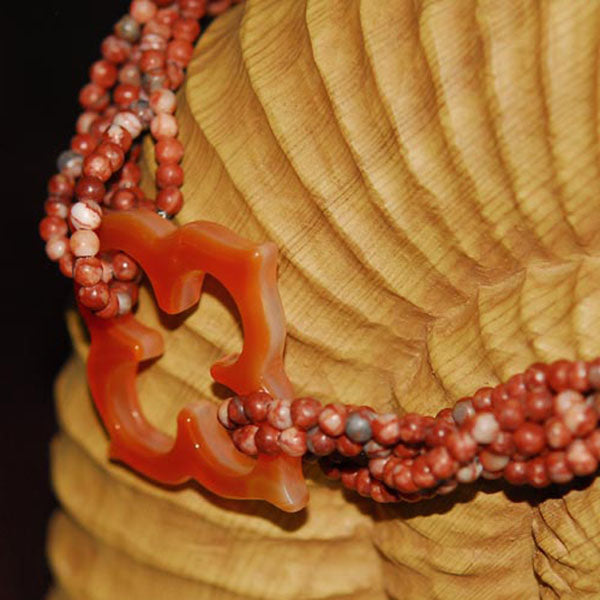 Multi Strand Twisted Sesame Jasper Necklace with Floral Cutout Orange Agate Focal Pendant