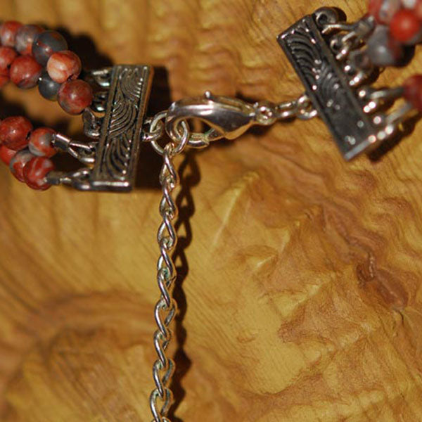 Multi Strand Twisted Sesame Jasper Necklace with Floral Cutout Orange Agate Focal Pendant